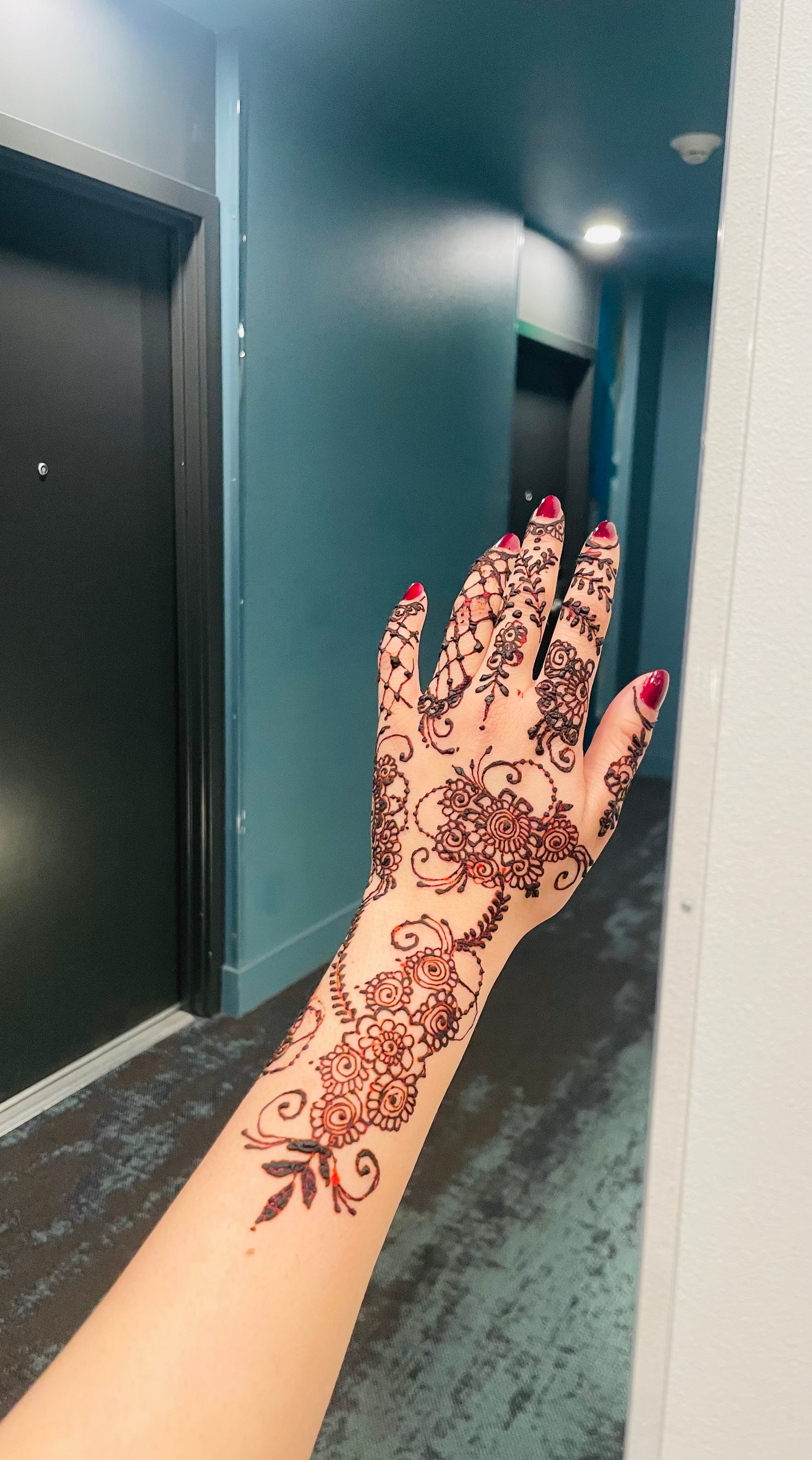 Ornate bridal mehndi hand back
